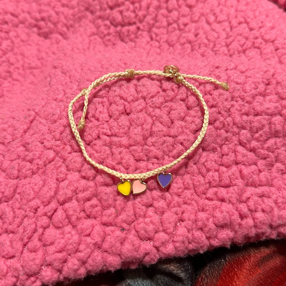 Cream bracelet with heart charms from Pura Vida